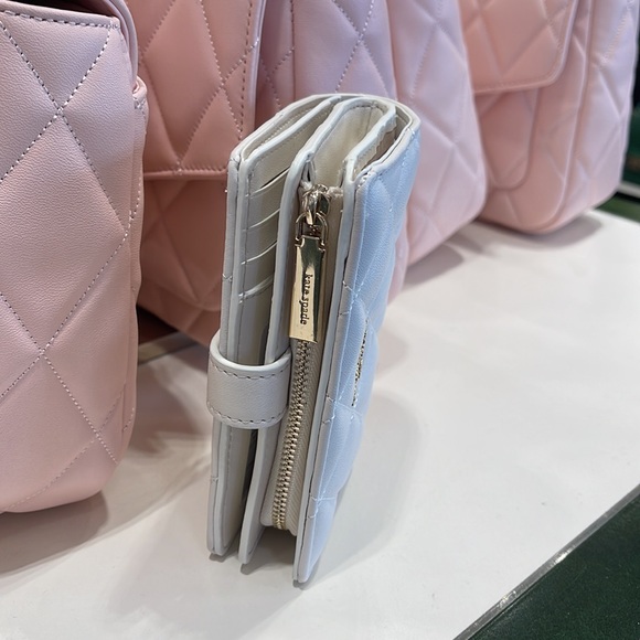 Kate Spade Carey Medium Compartment Bifold Wallet 
COLOR: Parchment - Picture 4 of 16